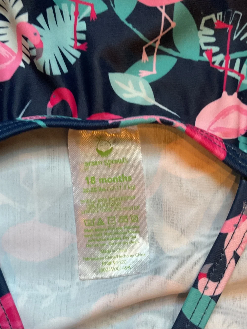 Girls Navy Flamingo Print One-Piece Swimsuit with Pink & Teal Accents